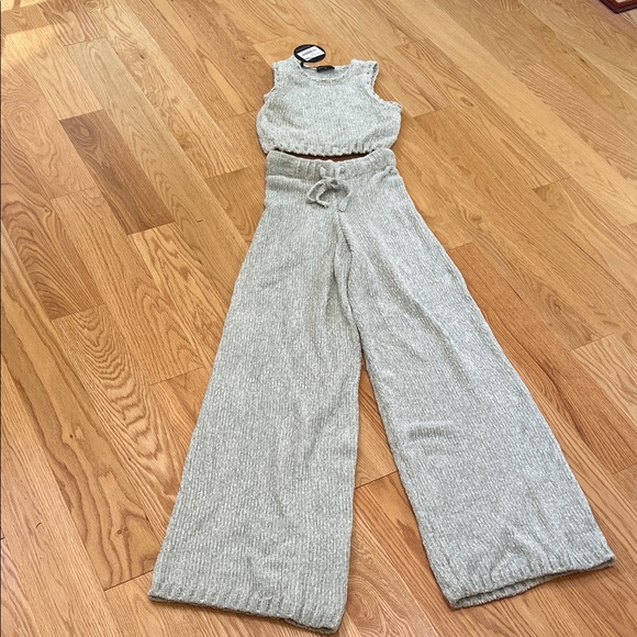 White fox XS Secret romance crop top and flared pants set.